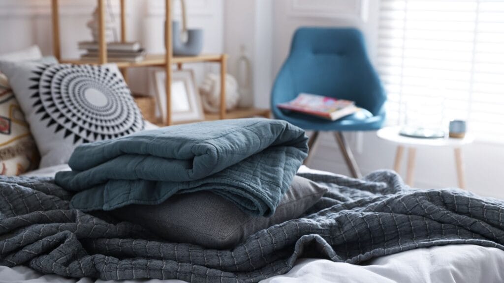 Cozy bedroom with blue chair